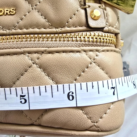 Michael Kors Cream Quilted Backpack with Gold Accents - Picture 15 of 17